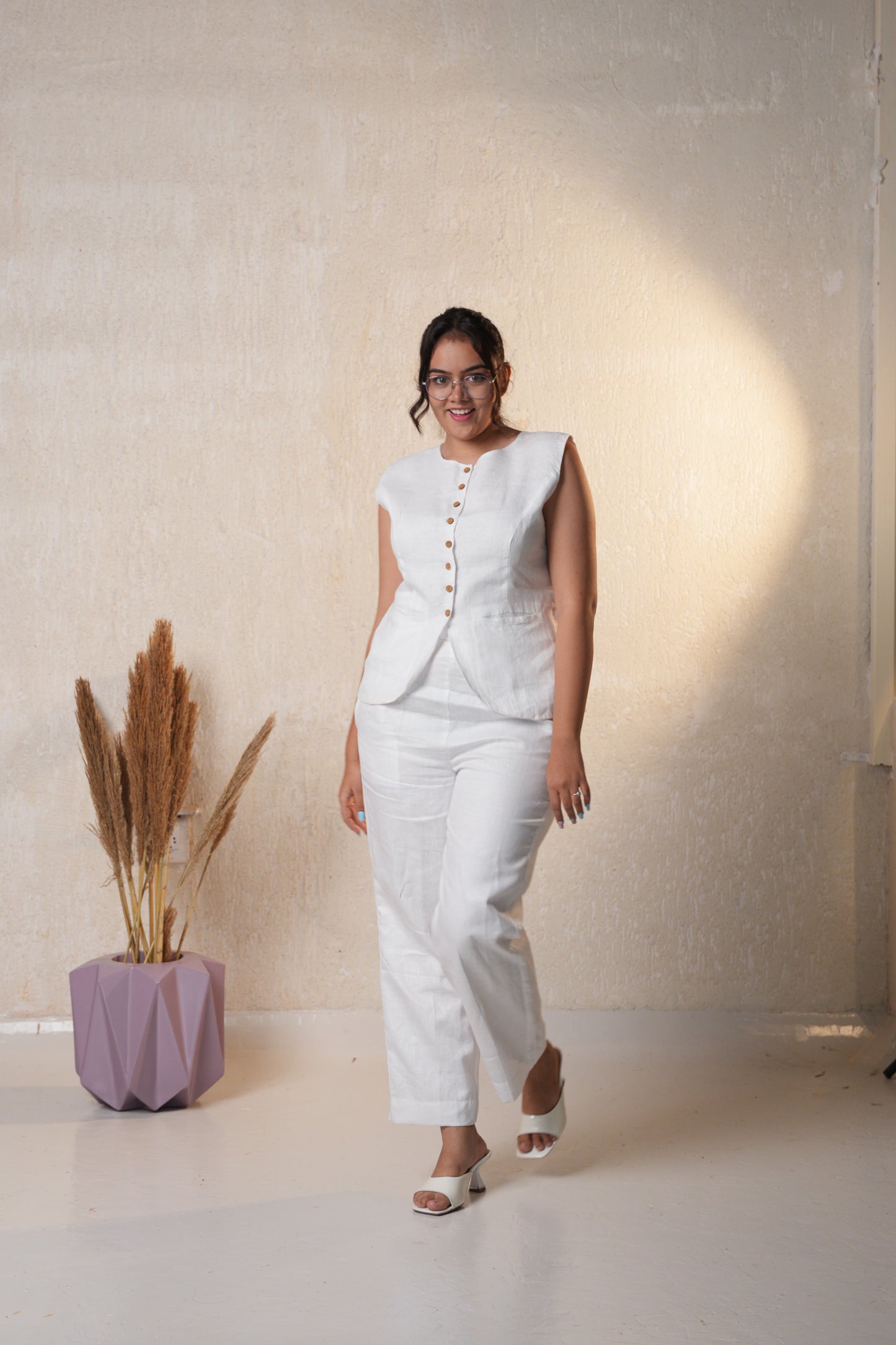 Women’s long vest top with a sleek, elongated silhouette, ideal for casual or semi-formal wear.