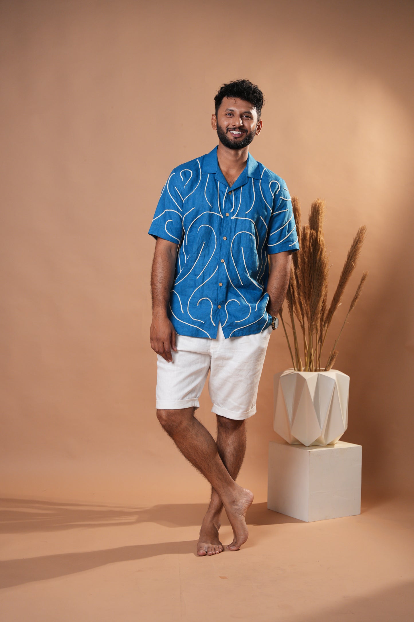 Deep blue casual shirt with elegant embroidery and a relaxed fit for everyday wear.