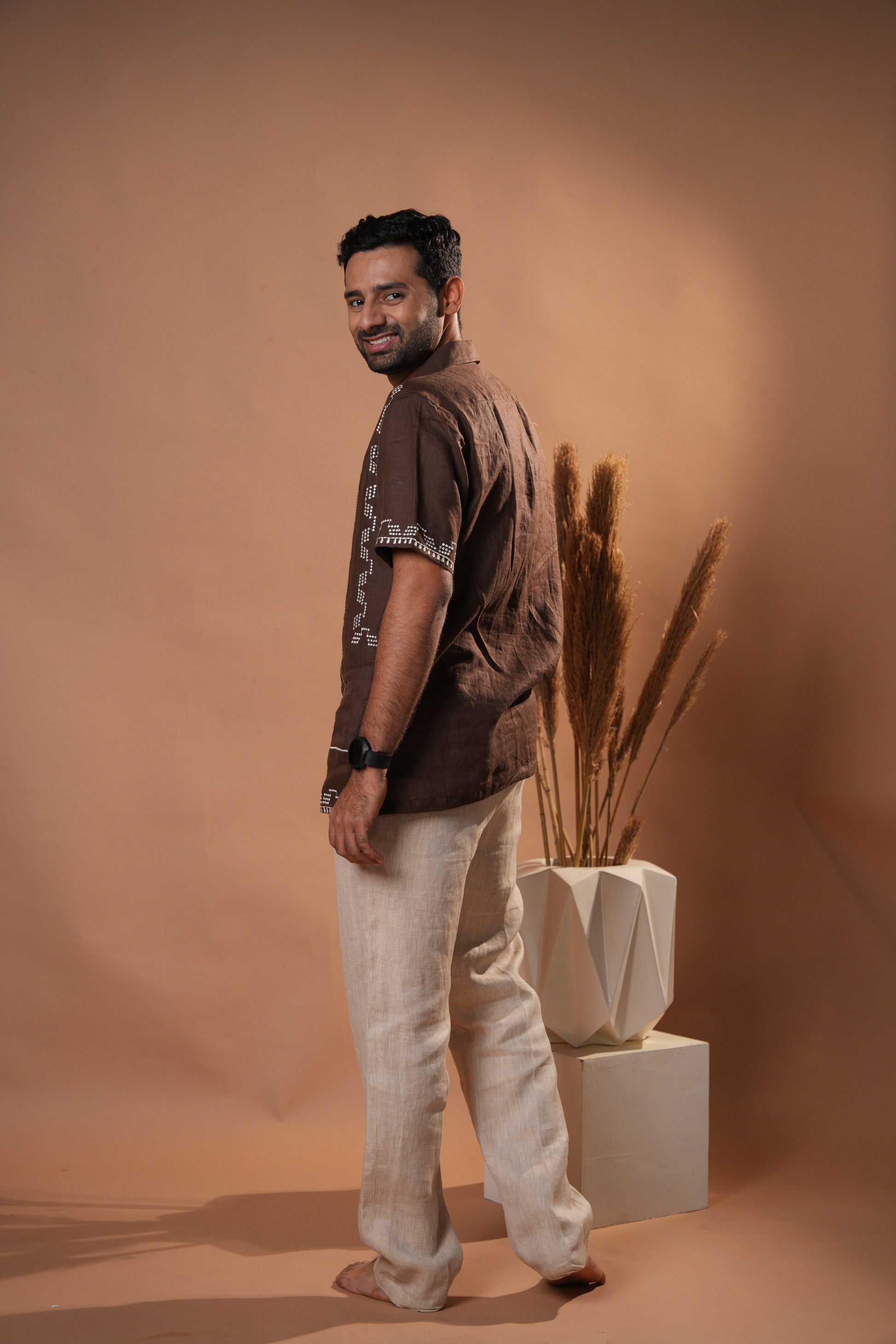 Stylish brown casual shirt with elegant embroidery, crafted from soft and durable fabric.