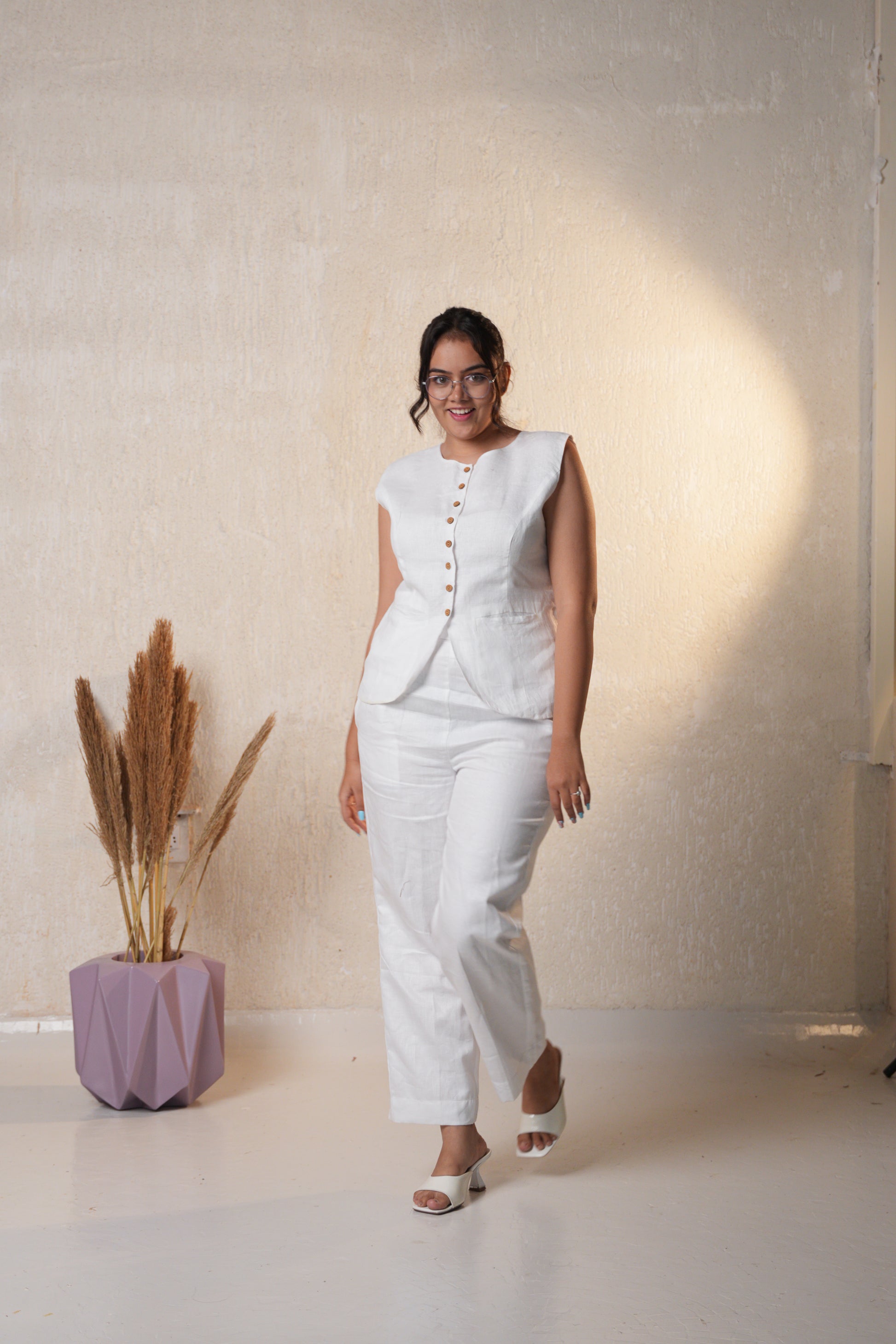 Women’s long vest top with a sleek, elongated silhouette, ideal for casual or semi-formal wear.
