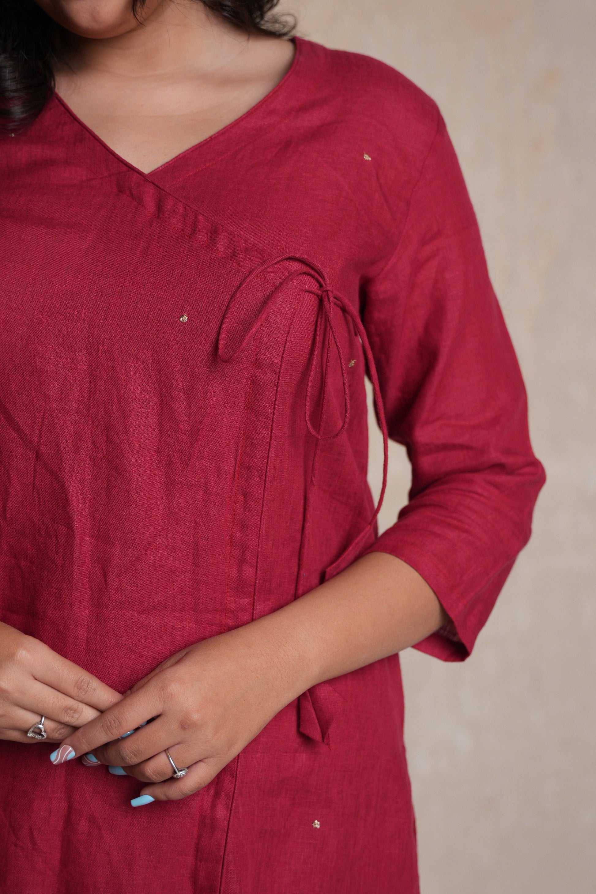 Stylish straight Angrakha kurta offering a combination of traditional craftsmanship and contemporary style.