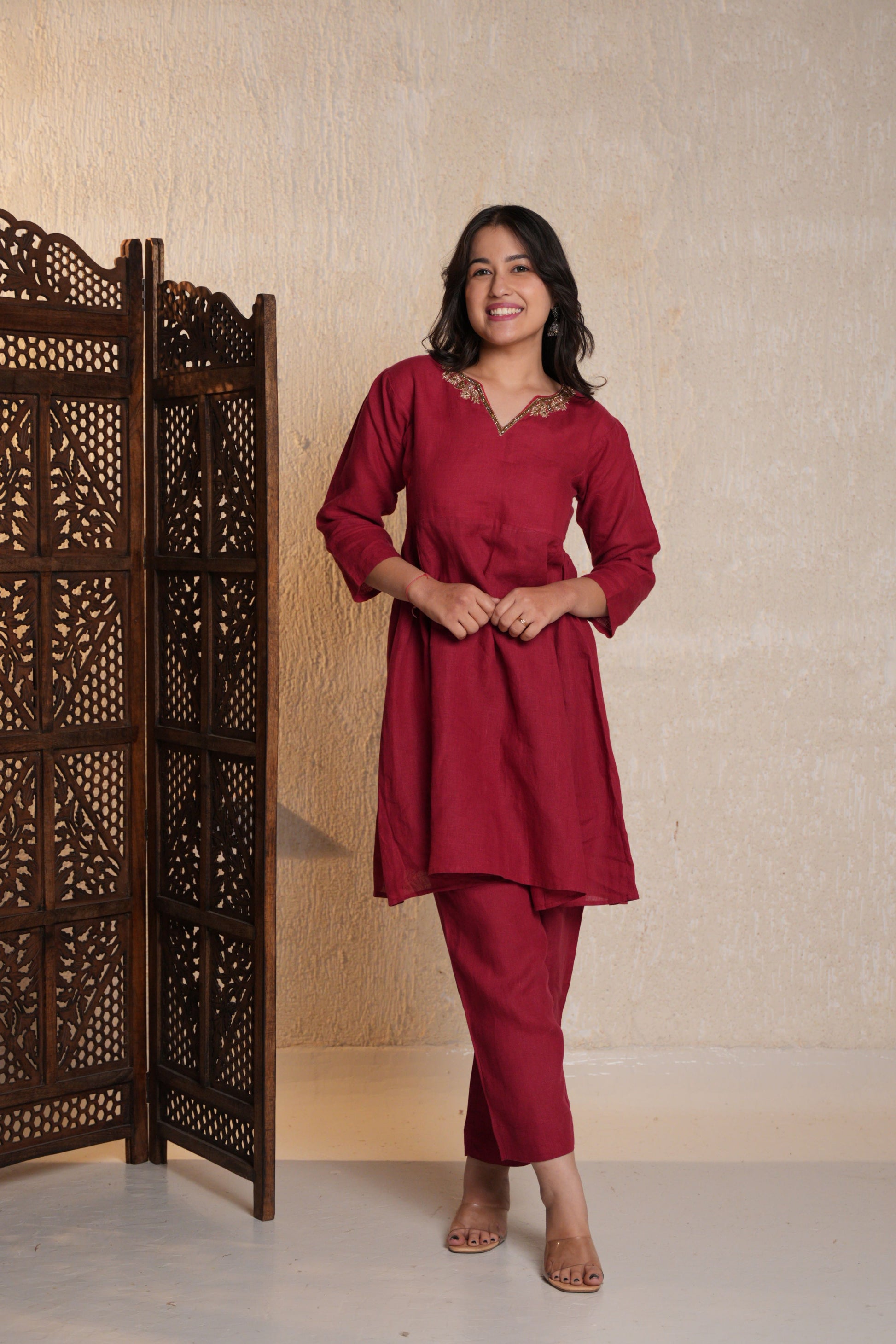 Luxurious Zardozi embroidered kurta set featuring intricate gold threadwork and a timeless design.