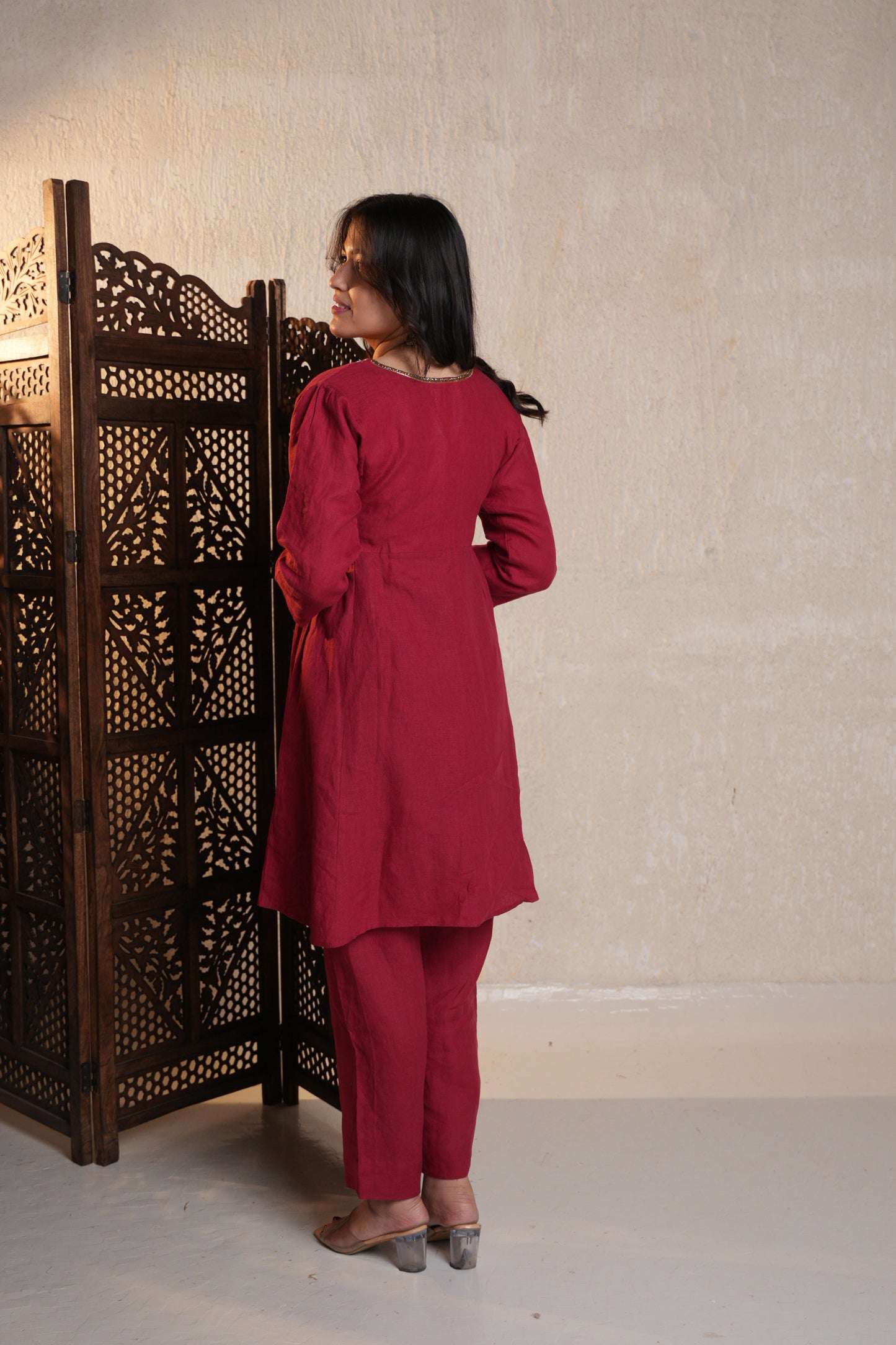 Stylish Zardozi embroidered kurta set with a beautifully embellished design, offering a sophisticated look.