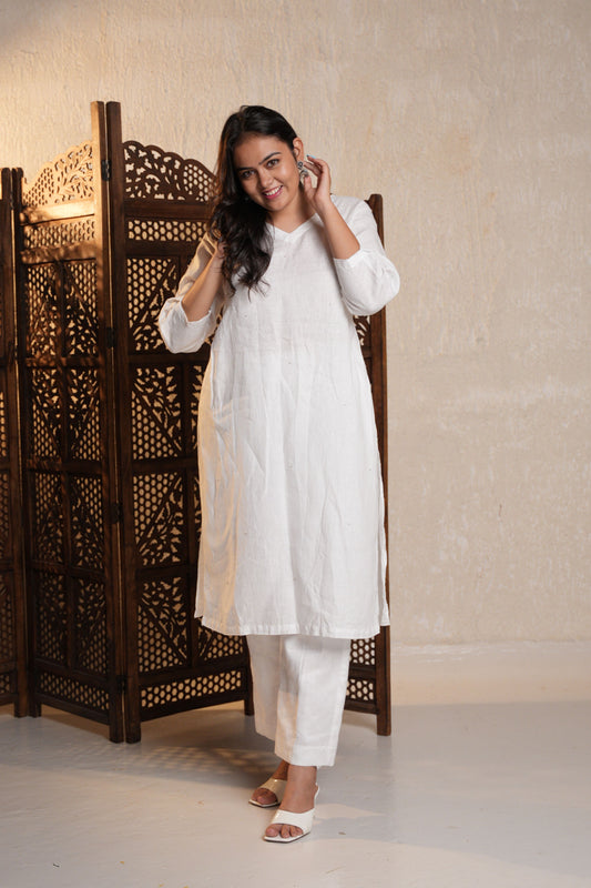 Elegant straight V-neck kurta featuring a flattering V-neckline and a sleek, straight-cut design.