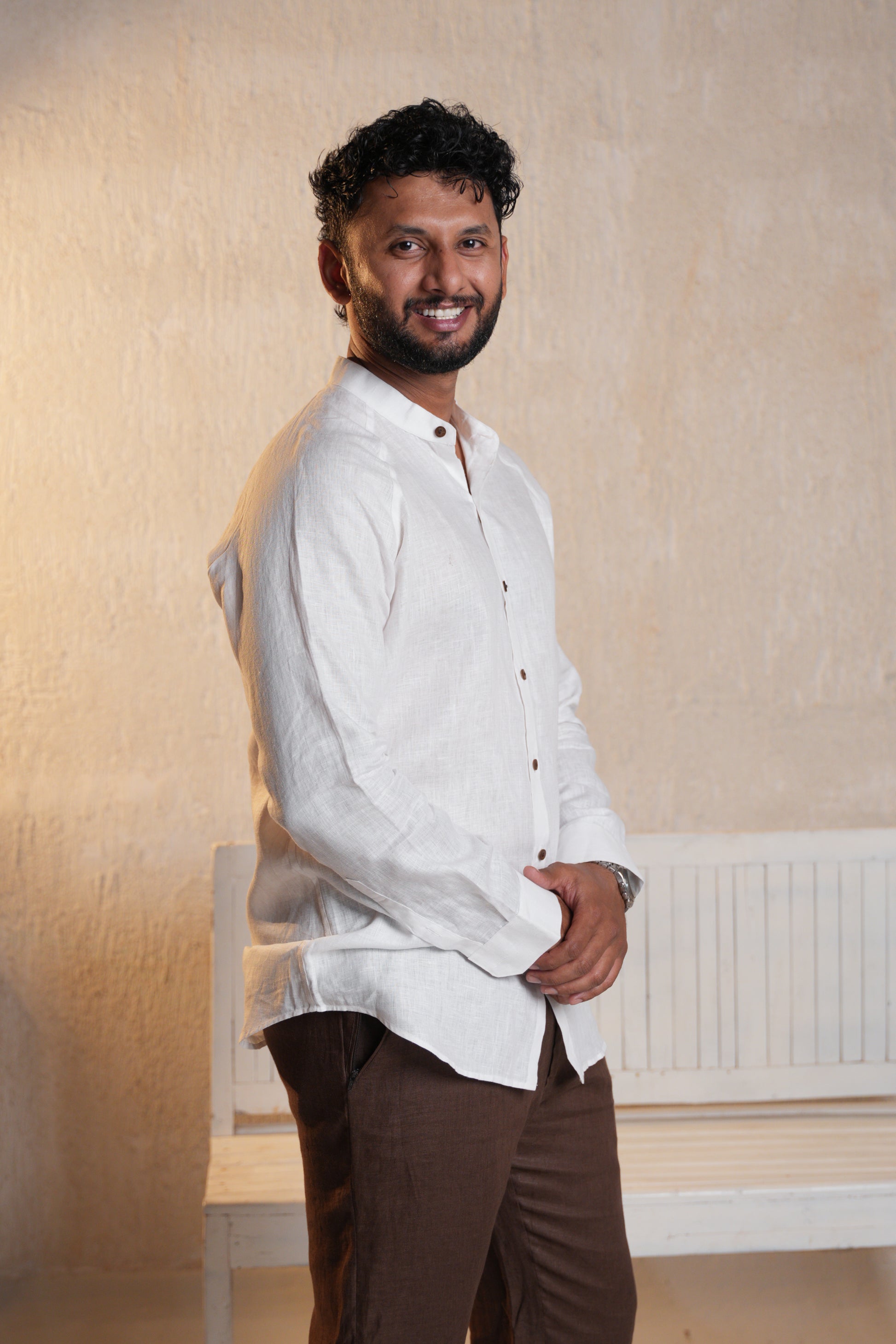 Close-up of a pure white raglan sleeve shirt, highlighting the smooth fabric and contrasting sleeves.