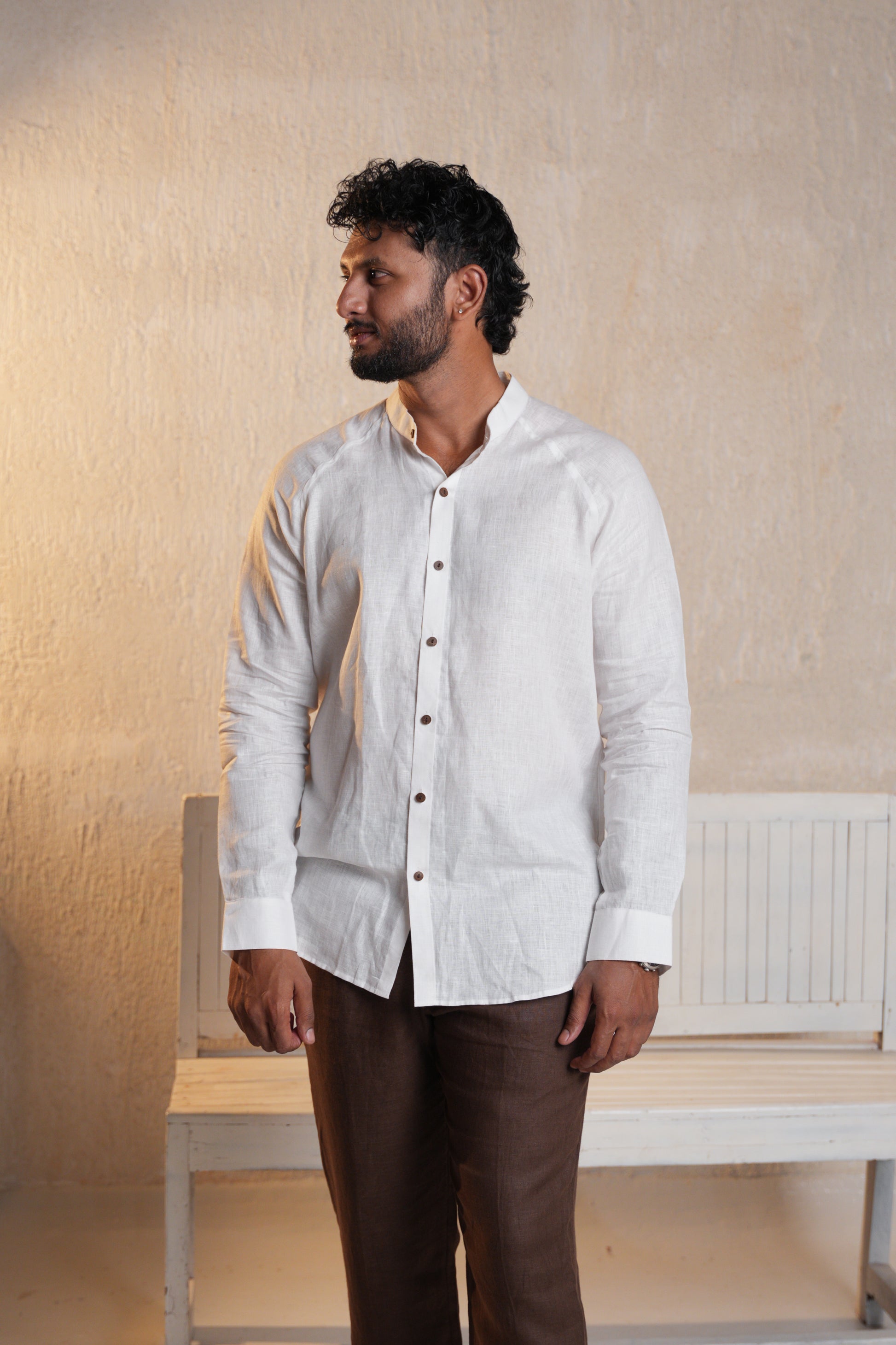 Timeless pure white raglan sleeve shirt, perfect for a casual, laid-back outfit with a modern twist.