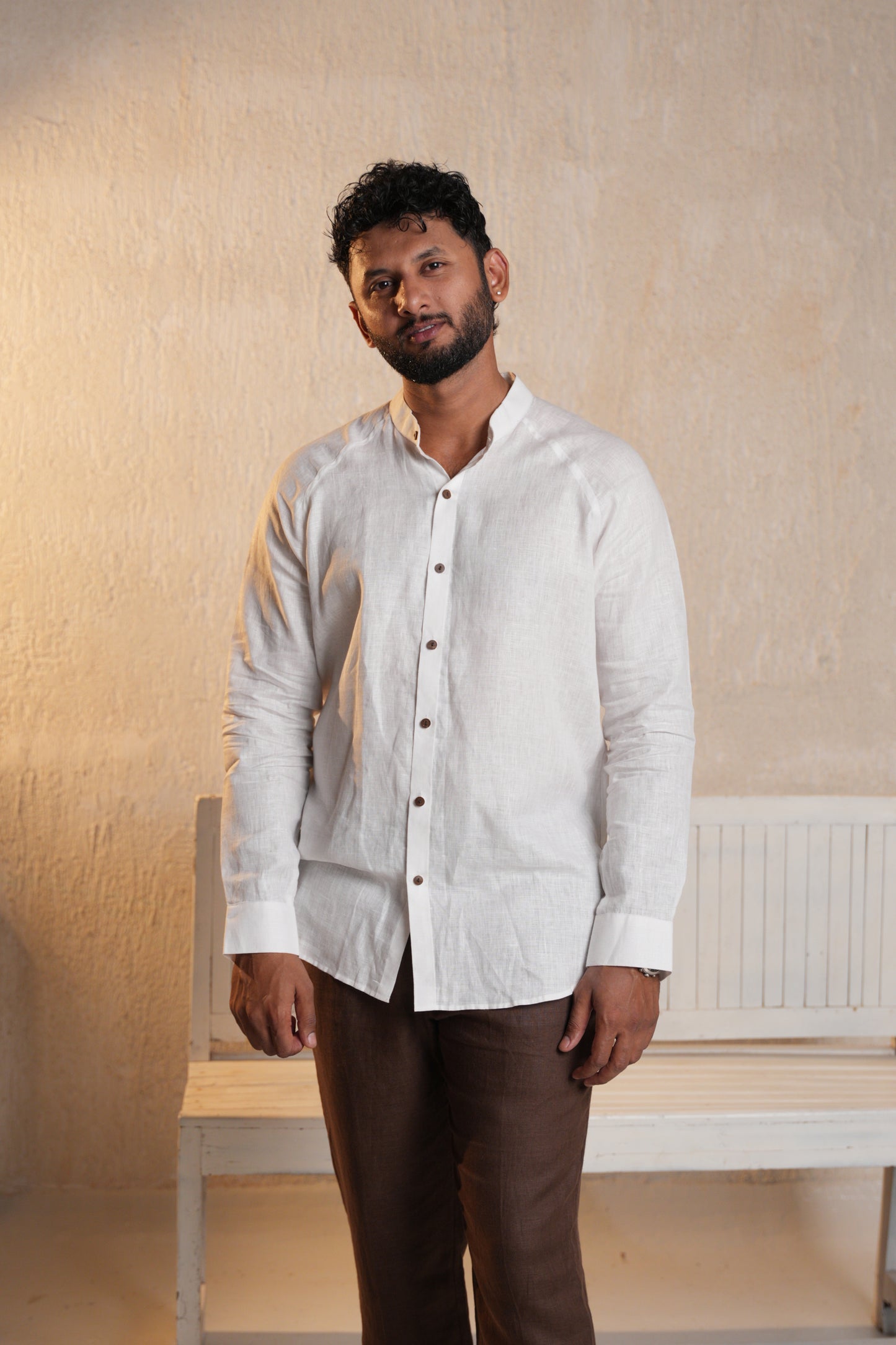 Classic raglan sleeve shirt in pure white, featuring contrasting sleeves and a comfortable, relaxed fit.