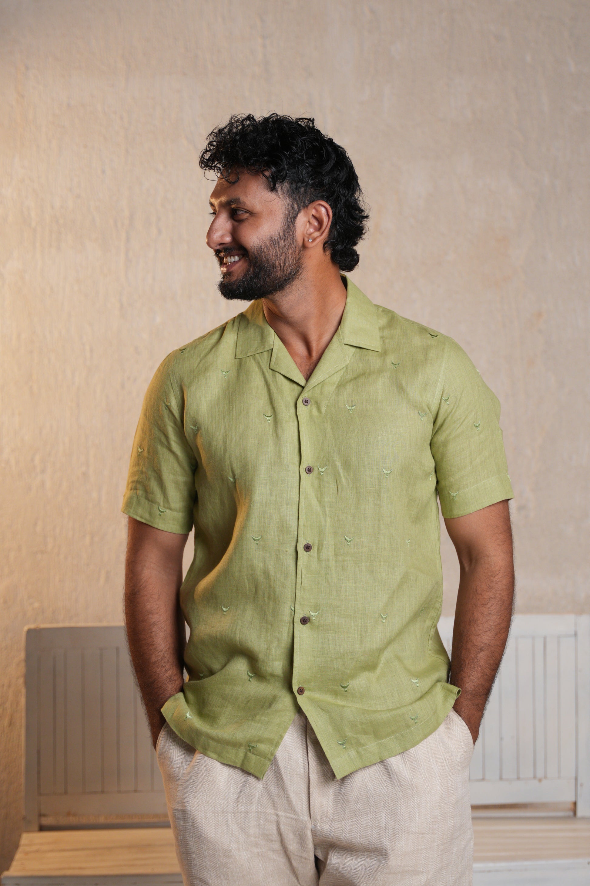 Sage green shirt with intricate embroidery, perfect for casual outings and relaxed occasions.