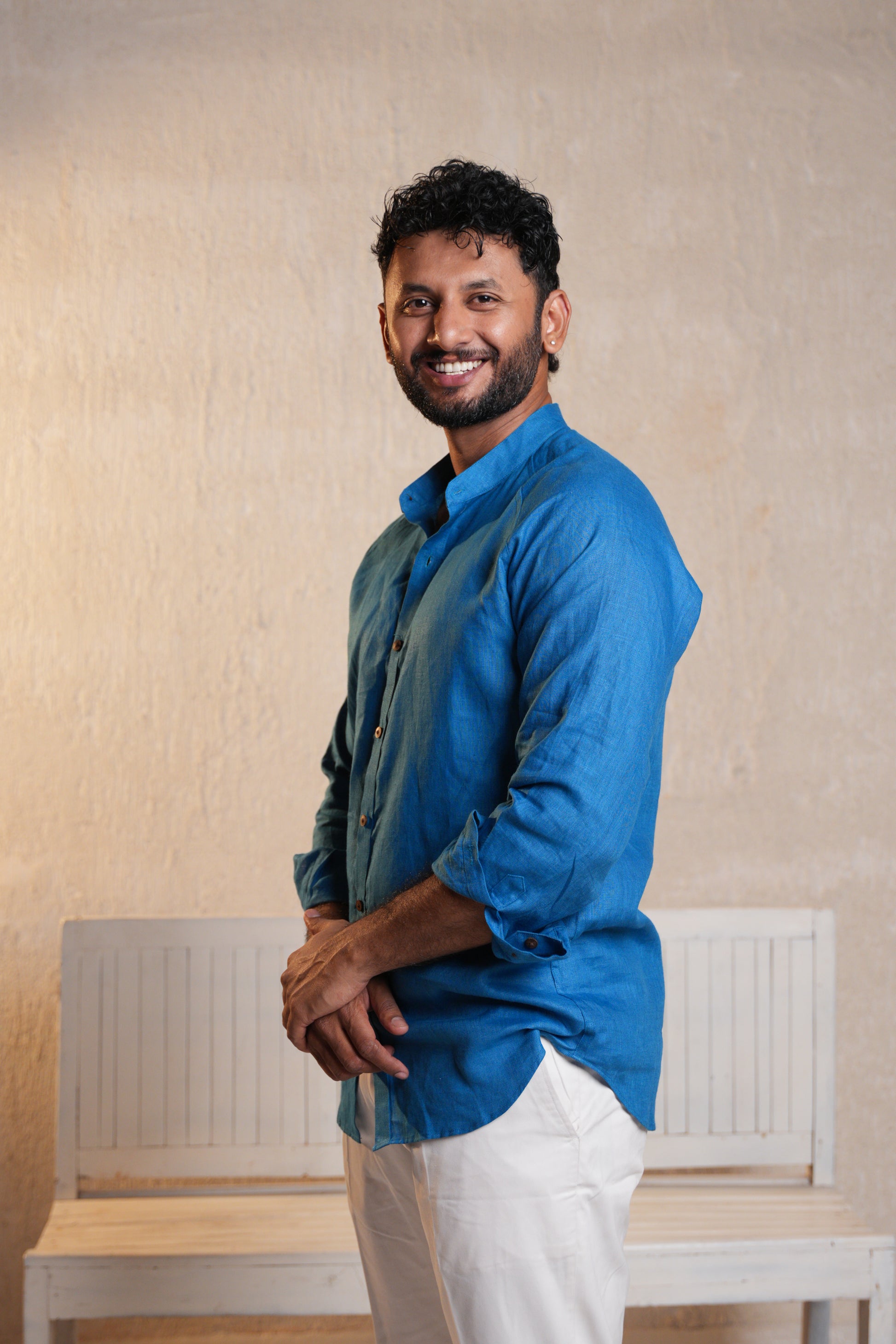 Stylish deep blue short kurta featuring a simple design, ideal for pairing with jeans or trousers.