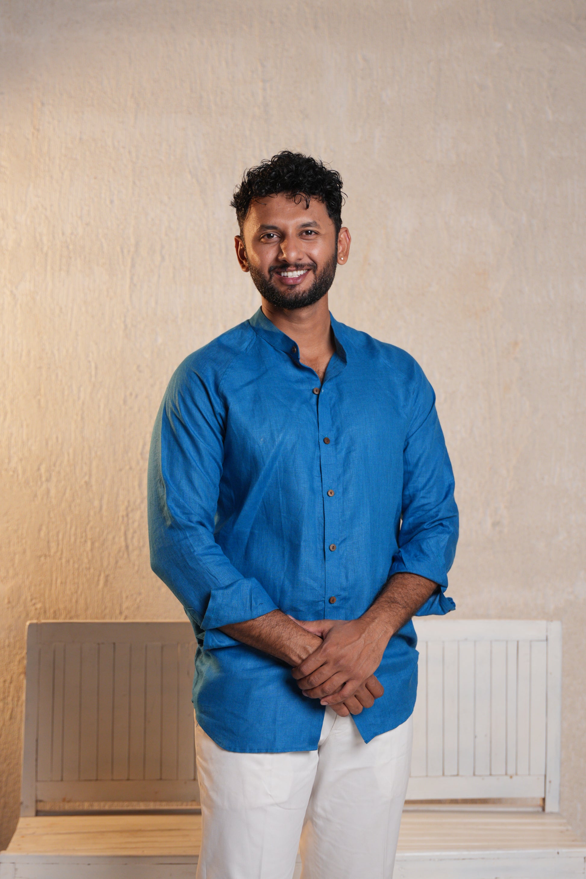 Stylish deep blue raglan sleeve shirt with a sporty design, perfect for a laid-back yet modern look.