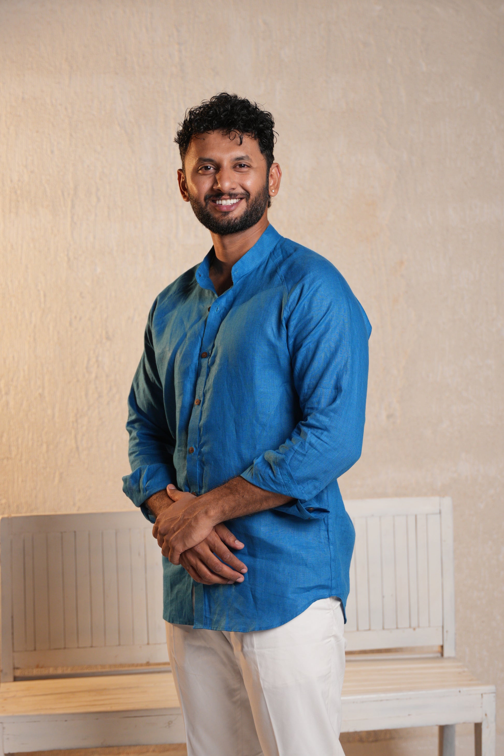 Chic raglan sleeve shirt in deep blue, offering a comfortable and casual fit with a trendy edge.