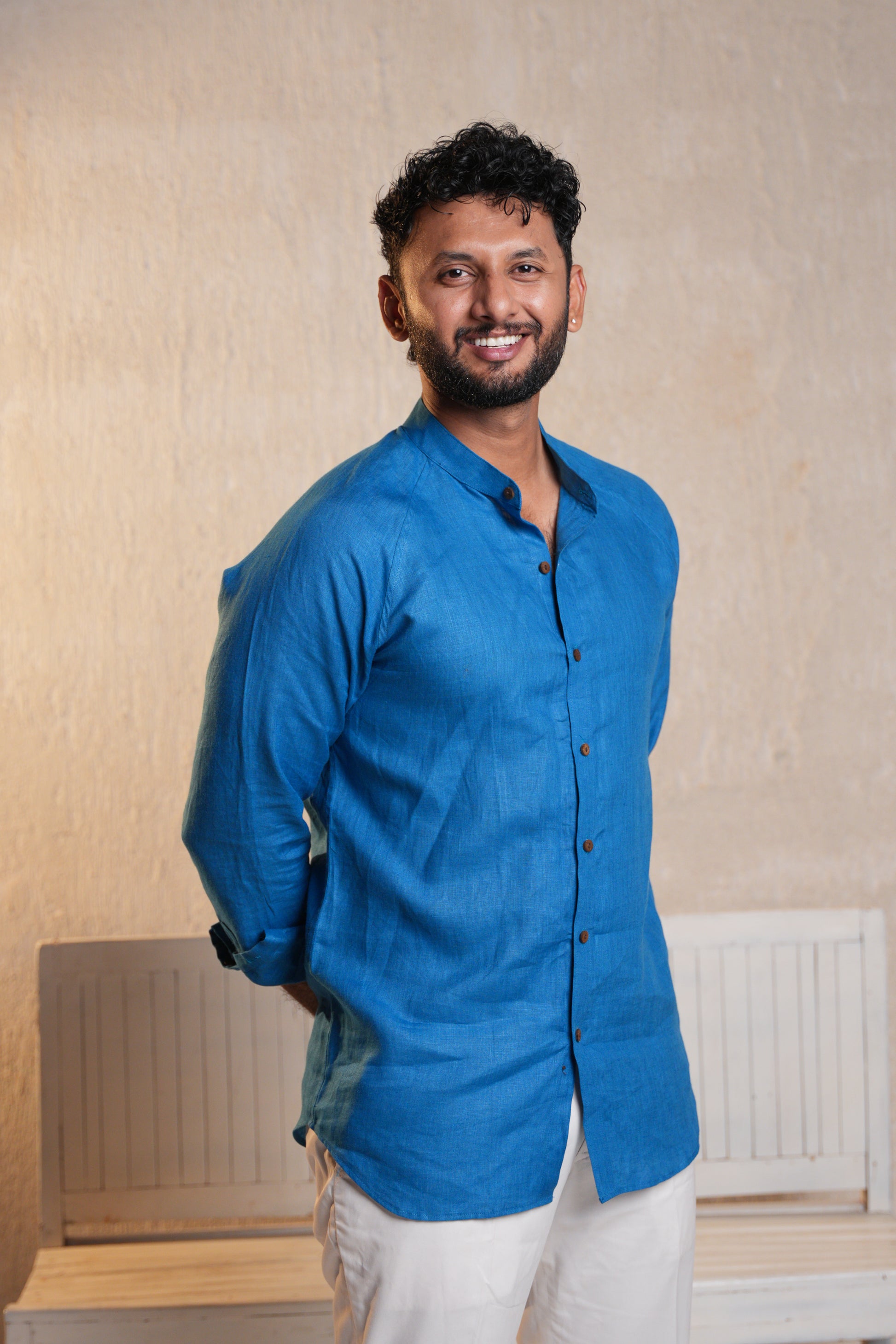 Casual raglan sleeve shirt in deep blue, featuring contrasting sleeves and a relaxed fit for everyday comfort.