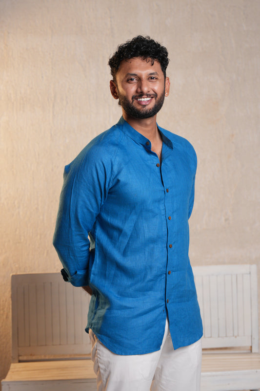 Casual raglan sleeve shirt in deep blue, featuring contrasting sleeves and a relaxed fit for everyday comfort.