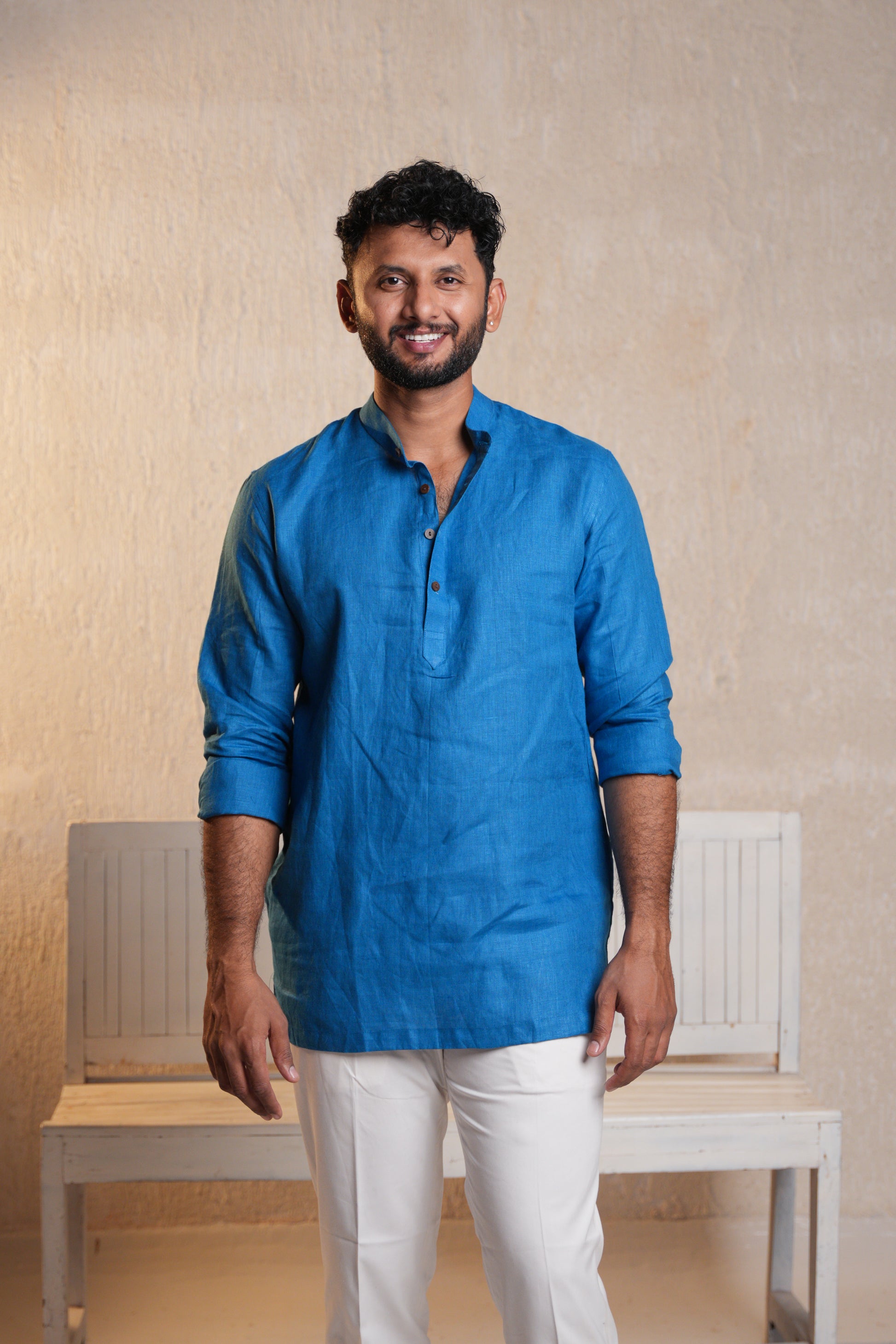 Plain deep blue short kurta with a relaxed fit, perfect for casual or semi-formal occasions.