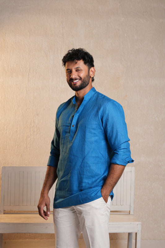 Men’s deep blue short kurta with a minimalistic design, offering both comfort and style.